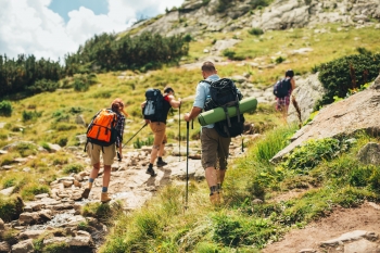 Hikers climbing up the mountain.