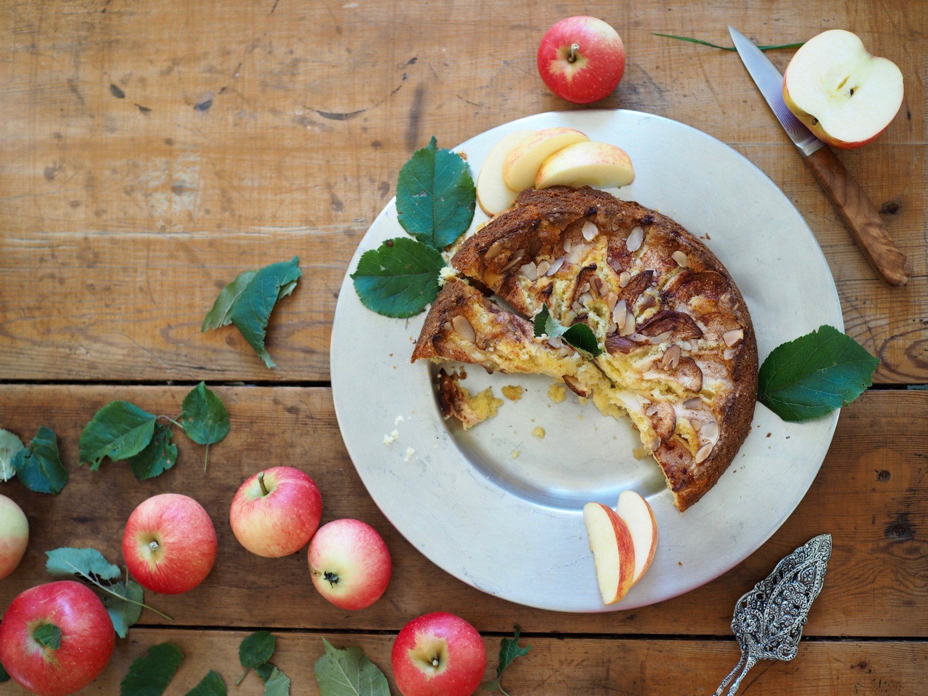apple cake on a table with apples