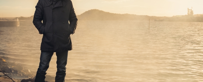 photo of Jo Nesbo standing in front of the sea in Norway