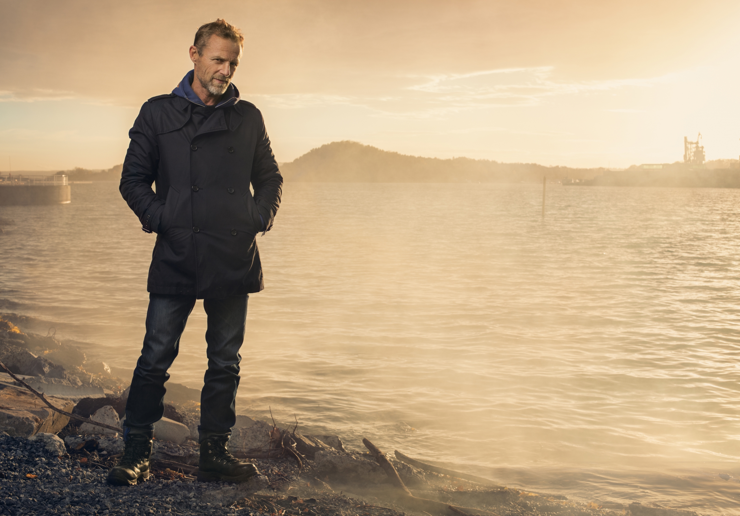 photo of Jo Nesbo standing in front of the sea in Norway