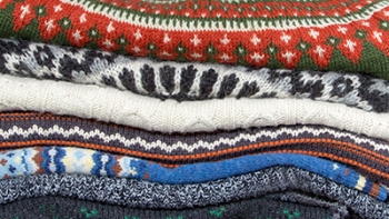 Stack of knitwear and cardigans