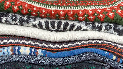 Stack of knitwear and cardigans